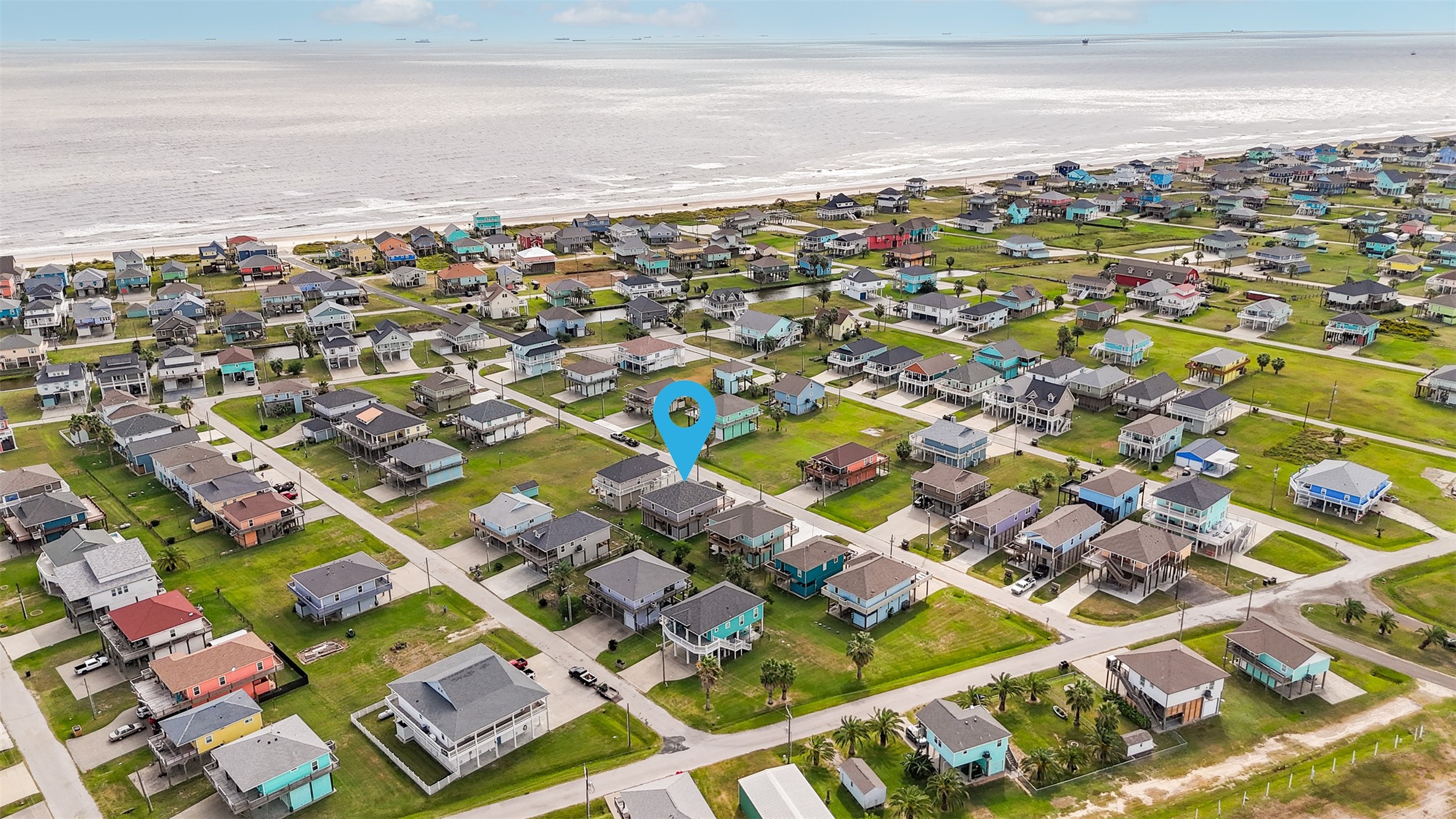976 Albatros Crystal Beach, TX 77650 - Photo 28 of 30 a view of a city with an ocean