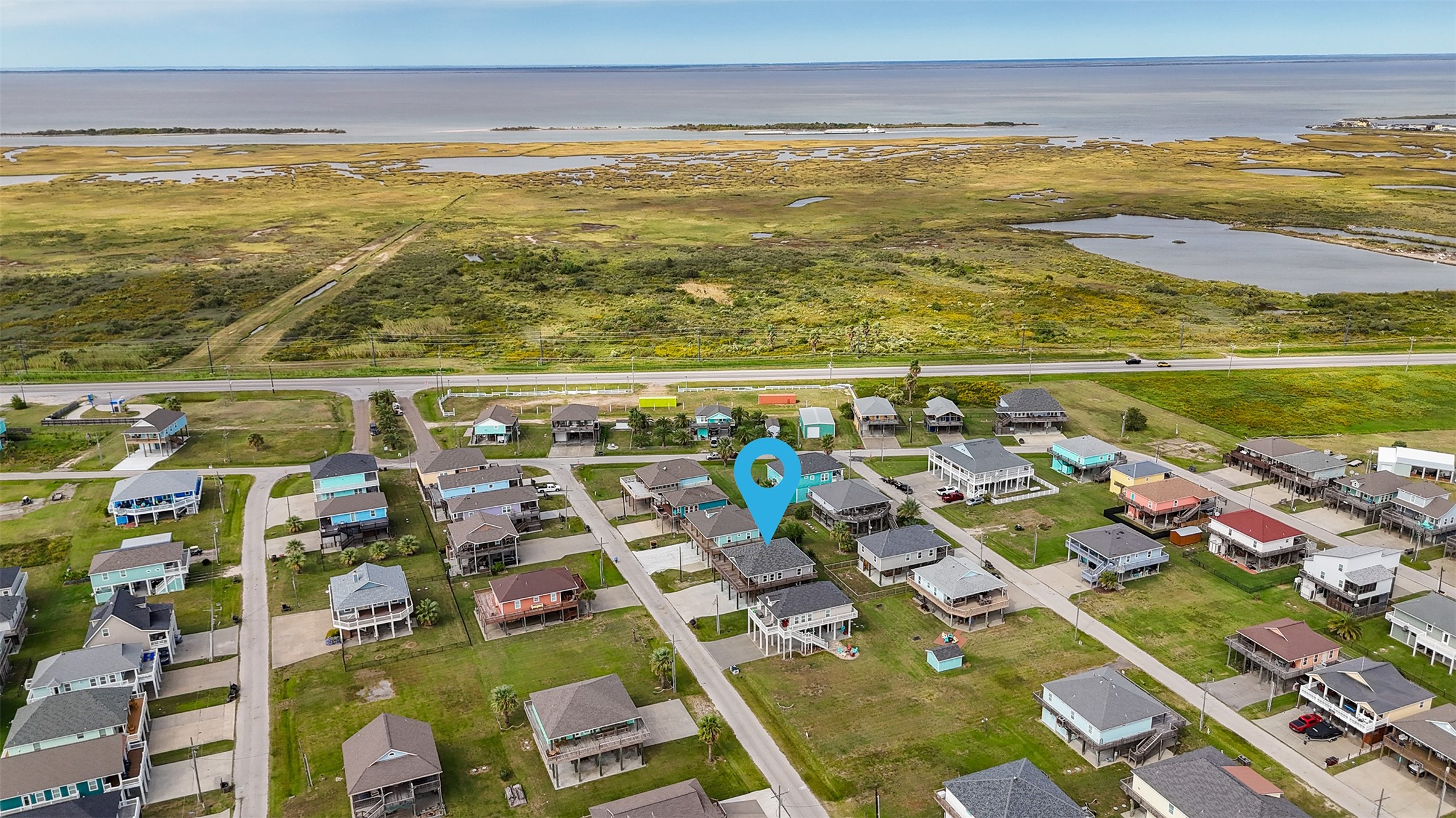 976 Albatros Crystal Beach, TX 77650 - Photo 29 of 30 a view of an ocean and beach