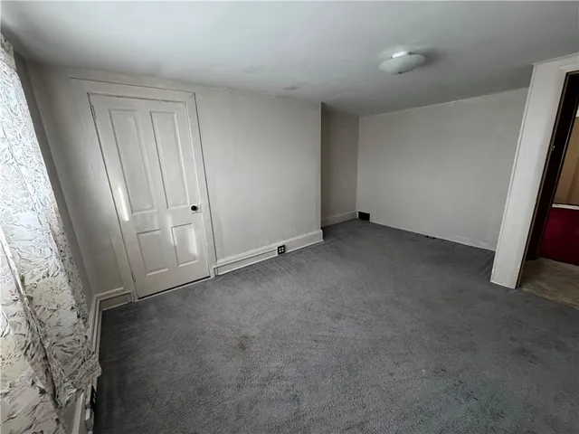 an empty room with window