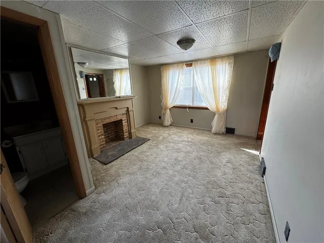 a view of a livingroom with a fireplace