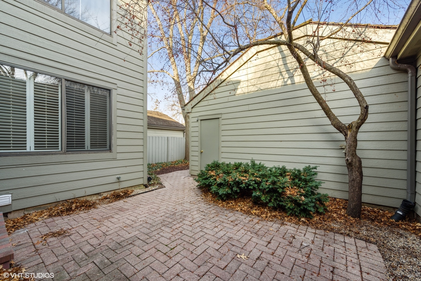 154 Timber Ridge Lane Lake Barrington, IL 60010 - Photo 3 of 26 a view of a house with a yard and a garden