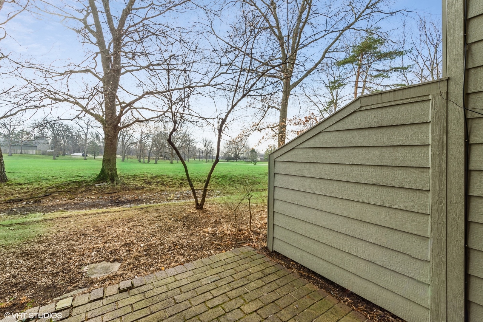 154 Timber Ridge Lane Lake Barrington, IL 60010 - Photo 24 of 26 a view of a house with a yard