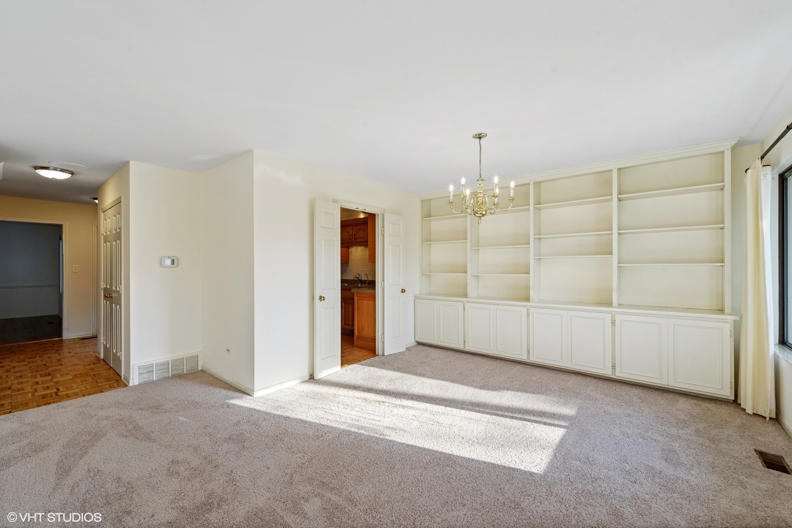154 Timber Ridge Lane Lake Barrington, IL 60010 - Photo 10 of 26 an empty room with kitchen and window