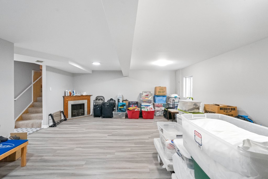 278 Charlotte Court Cary, IL 60013 - Photo 18 of 20 a bed room with a bed and a view of kitchen