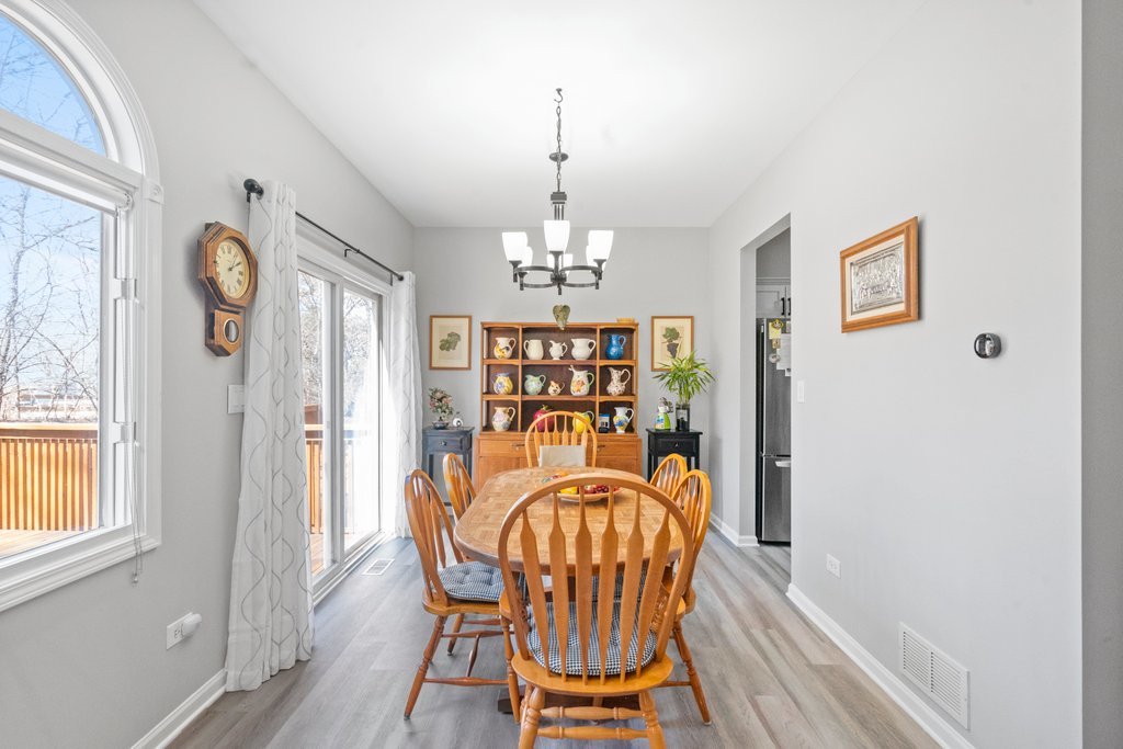 278 Charlotte Court Cary, IL 60013 - Photo 5 of 20 a view of a dining room with furniture and window