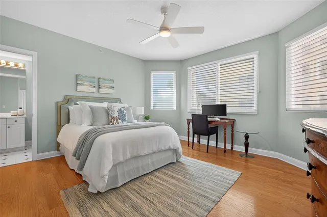 a view of a chairs and table in the balcony