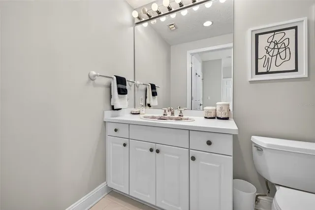 a view of a chairs and table in patio