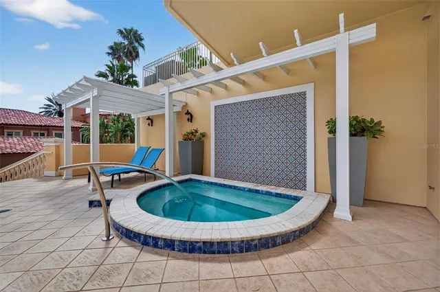 a view of a lake with tall buildings