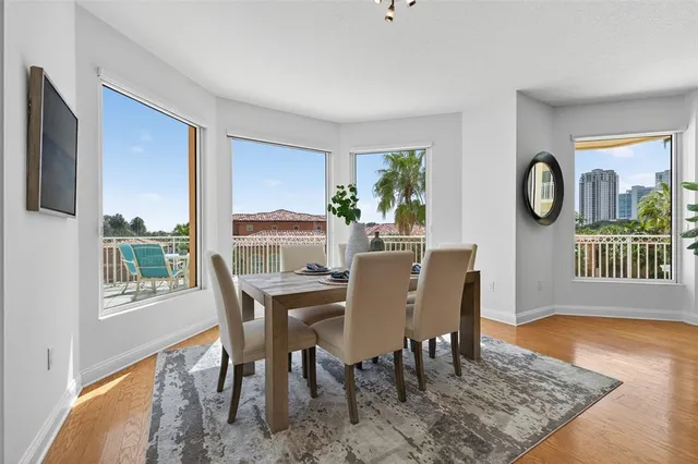 a view of kitchen with cabinets and wooden floor