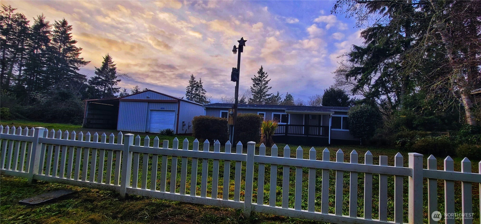 a view of a house with a roof deck