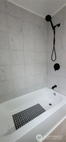 a bathroom with a bathtub