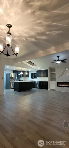 a view of living room with furniture and window