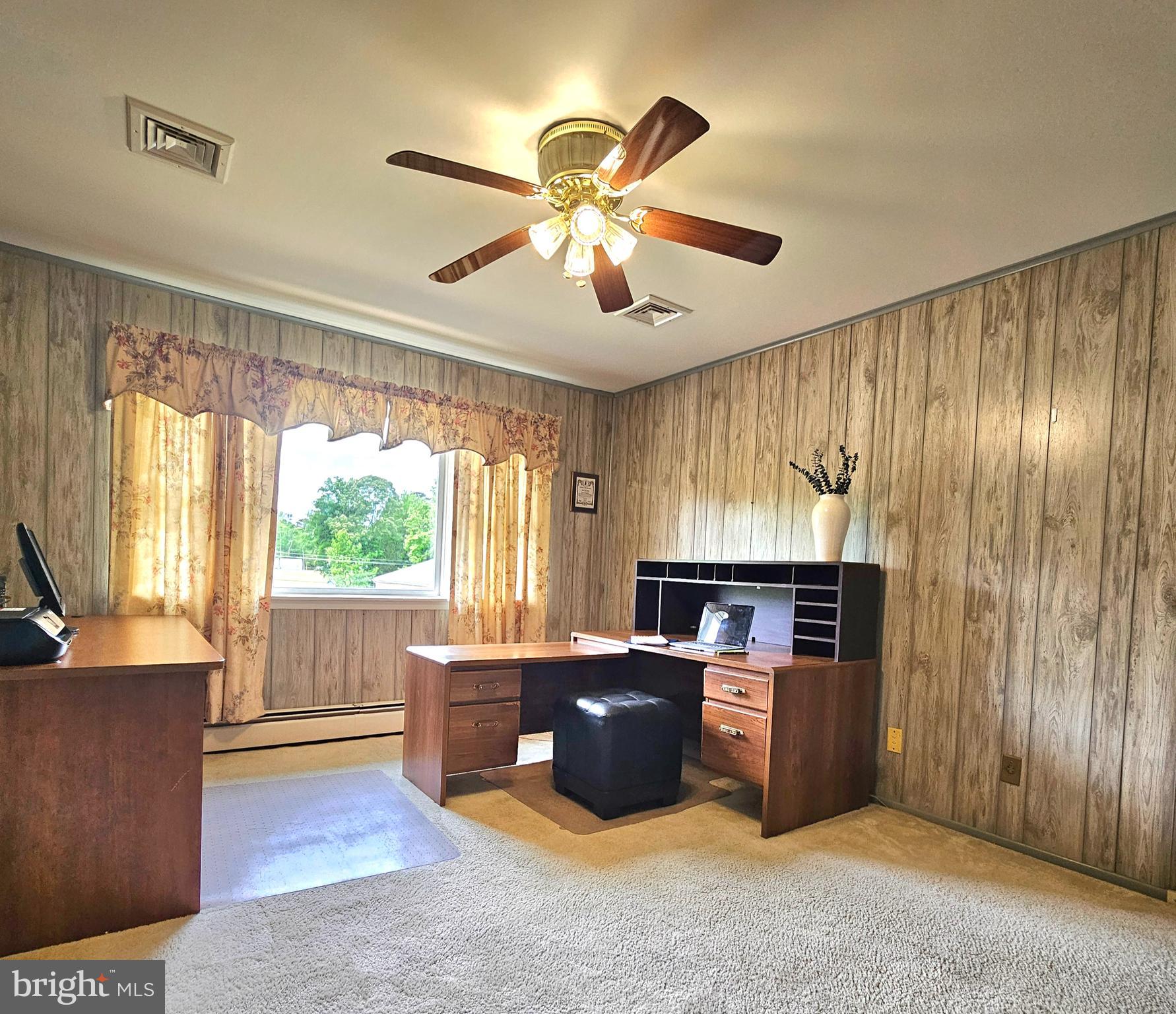 20098 Piney Point Road Callaway, MD 20620 - Photo 22 of 67 a open kitchen with cabinets a stove and a refrigerator