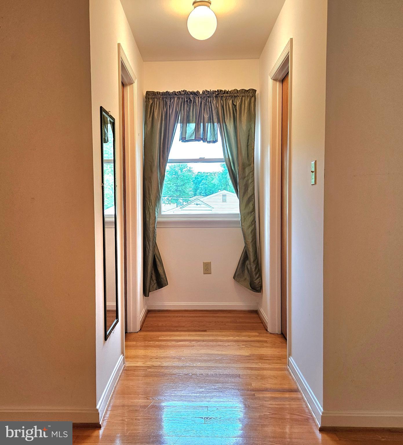 20098 Piney Point Road Callaway, MD 20620 - Photo 33 of 67 a view of a room with wooden floor and a window
