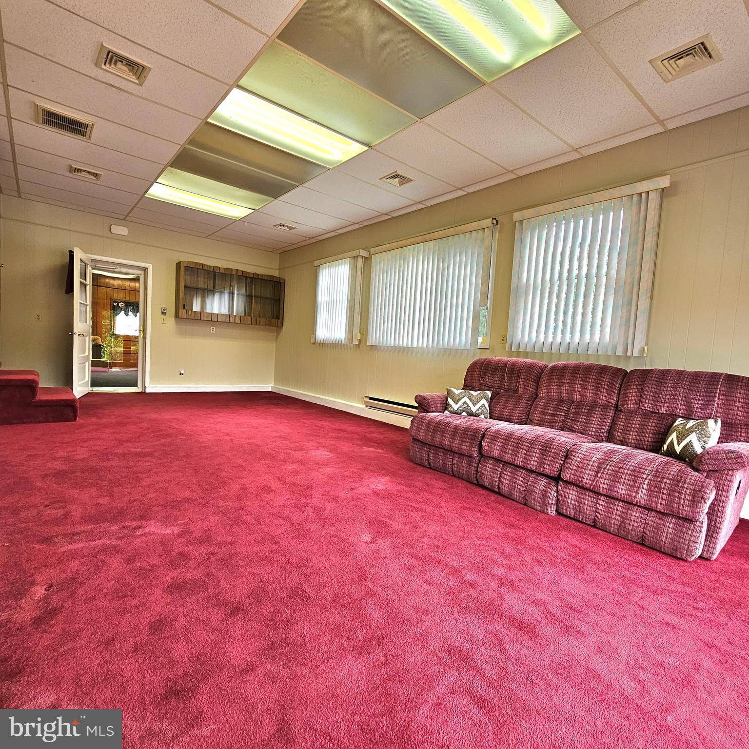 20098 Piney Point Road Callaway, MD 20620 - Photo 45 of 67 a living room with furniture and a window
