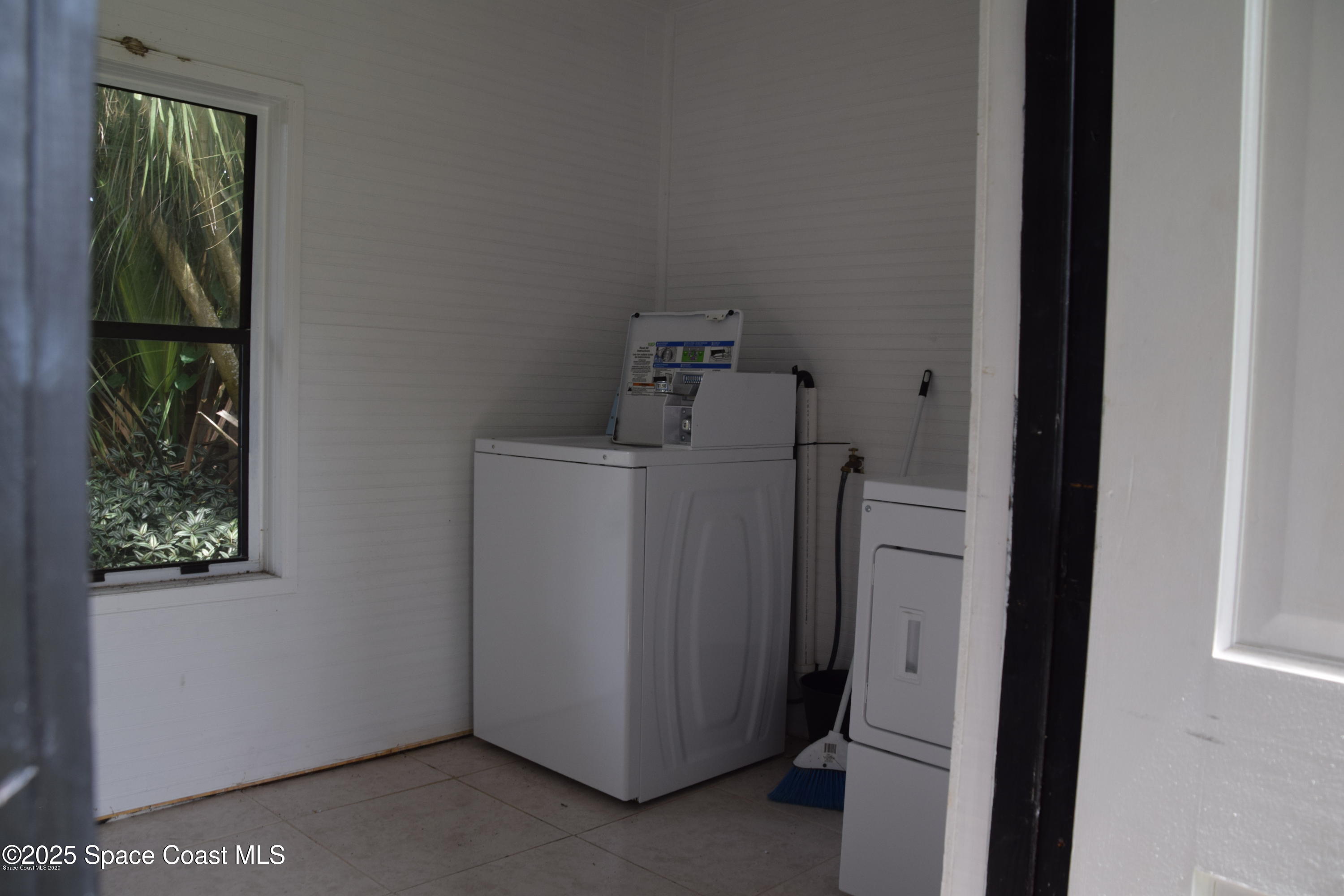 2100 Franklin Street, Unit 3 Melbourne, FL 32901 - Photo 21 of 22 a utility room with dryer and washer