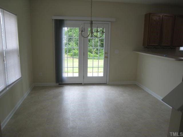 3542 Oneonta Avenue Raleigh, NC 27604 - Photo 4 of 6 a view of a room that has a window in it