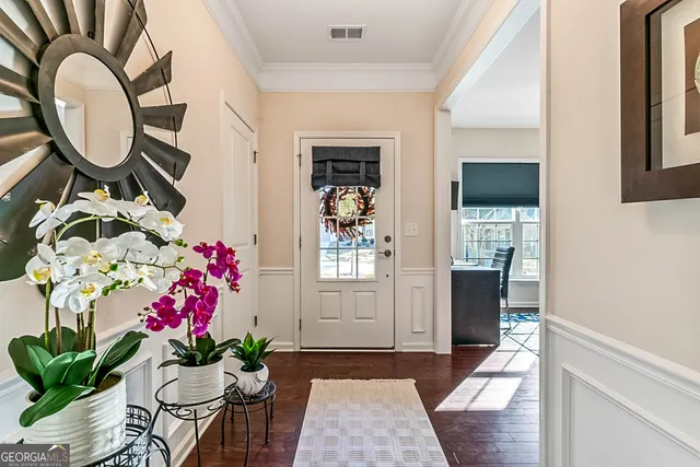 a front view of a house with a entryway