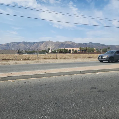 a view of a road with an ocean view