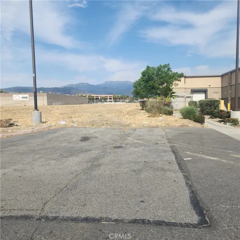 a view of a street with an ocean view