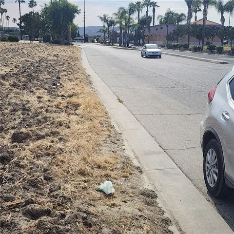 a view of a street with cars