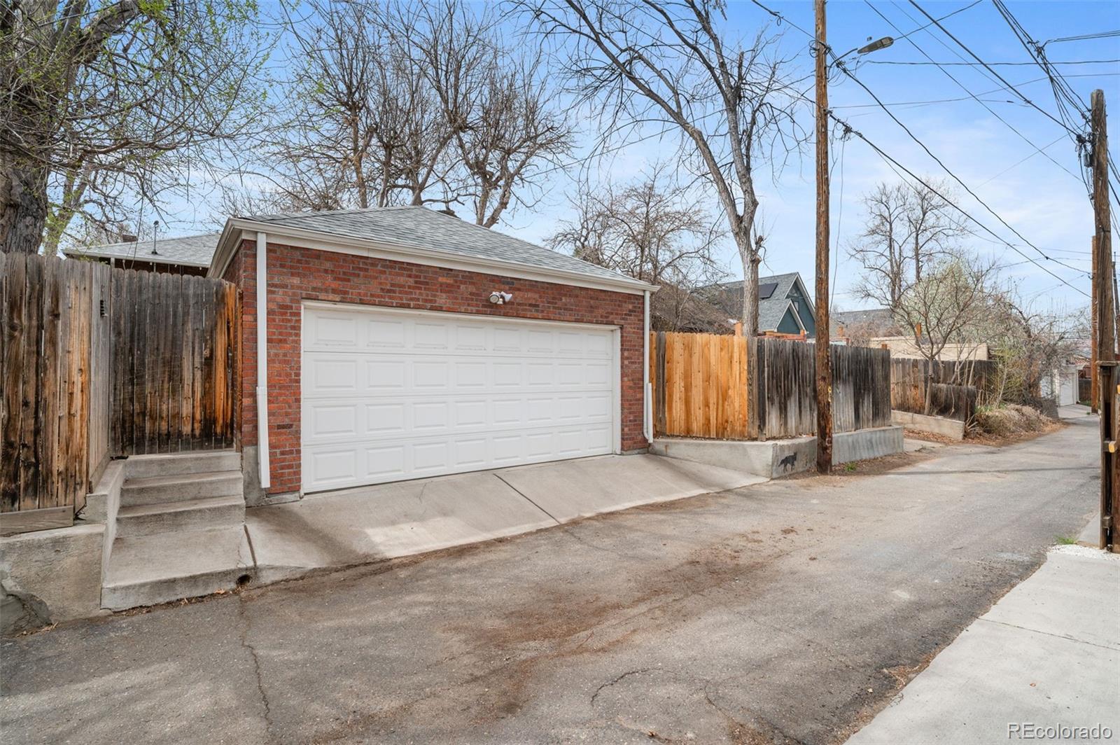 1136 Cook Street Denver, CO 80206 - Photo 32 of 42 a view of entrance gate of house