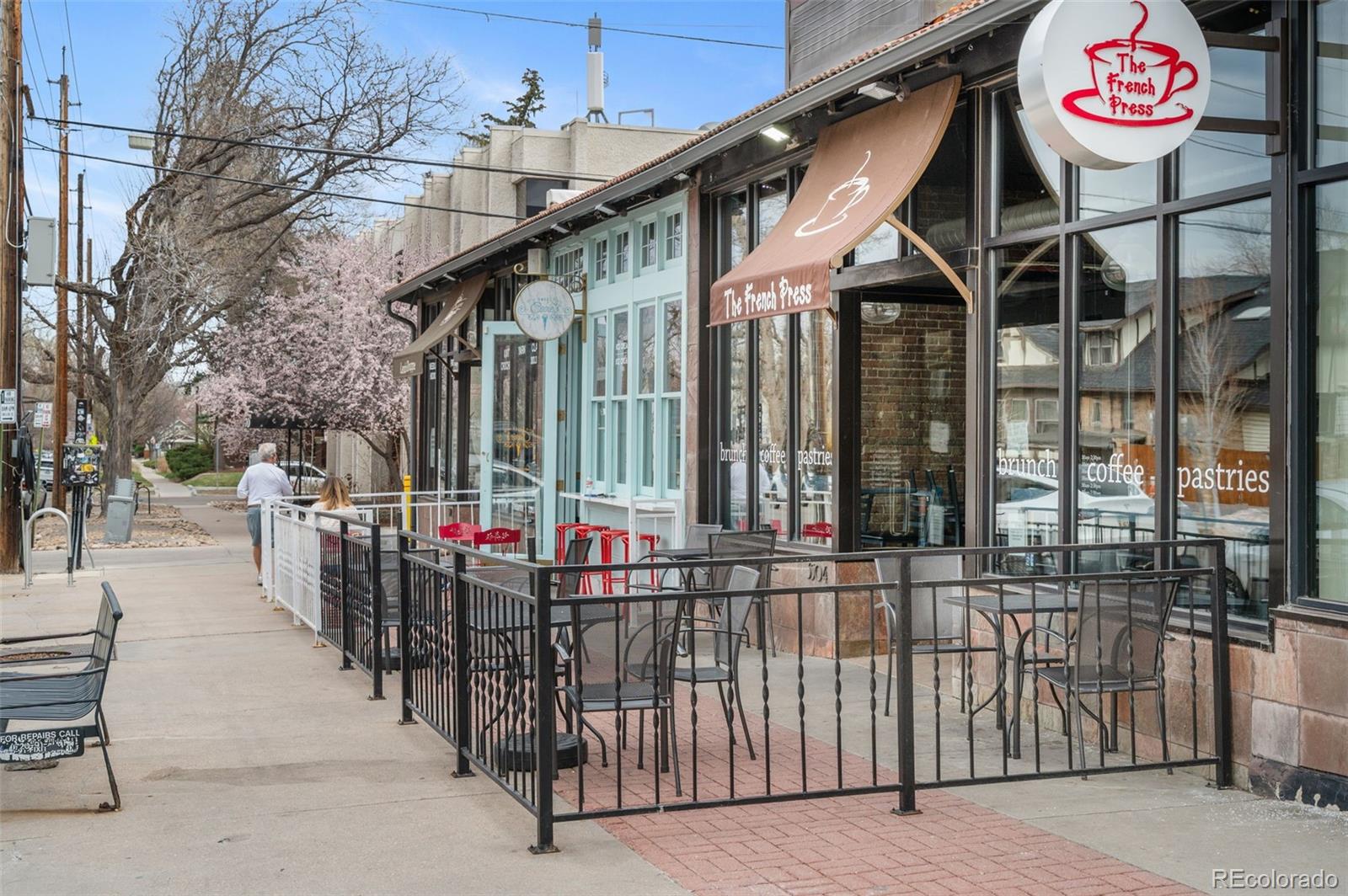 1136 Cook Street Denver, CO 80206 - Photo 35 of 42 a view of a cafe with sitting area
