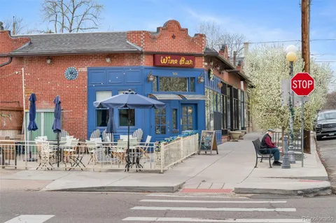 a view of a cafe with sitting area