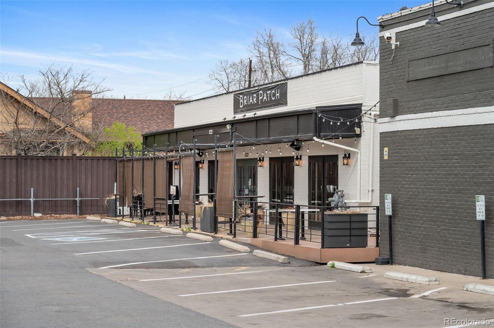 1136 Cook Street Denver, CO 80206 - Photo 37 of 42 a view of a building with a street
