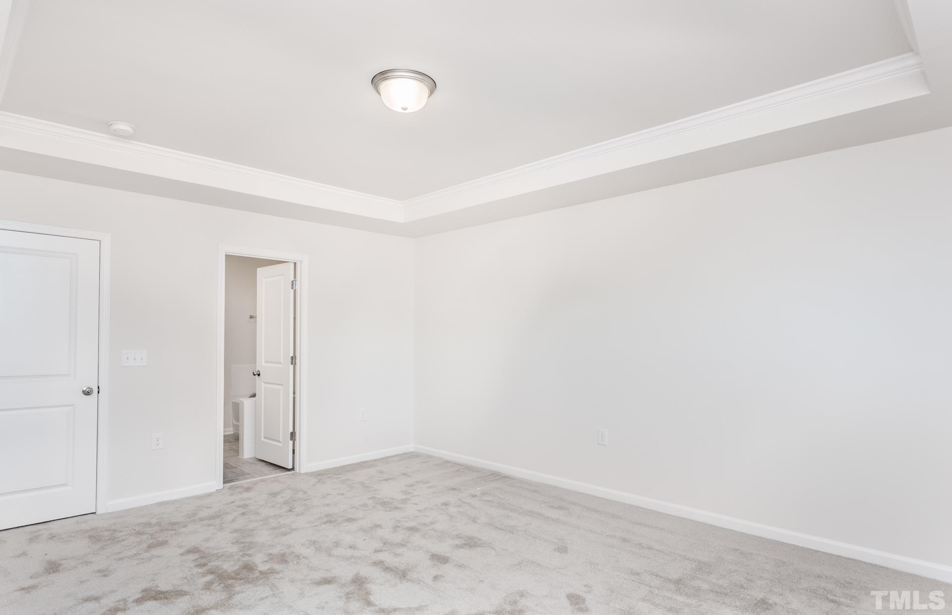 5714 Volos Avenue Raleigh, NC 27603 - Photo 5 of 20 a view of an empty room