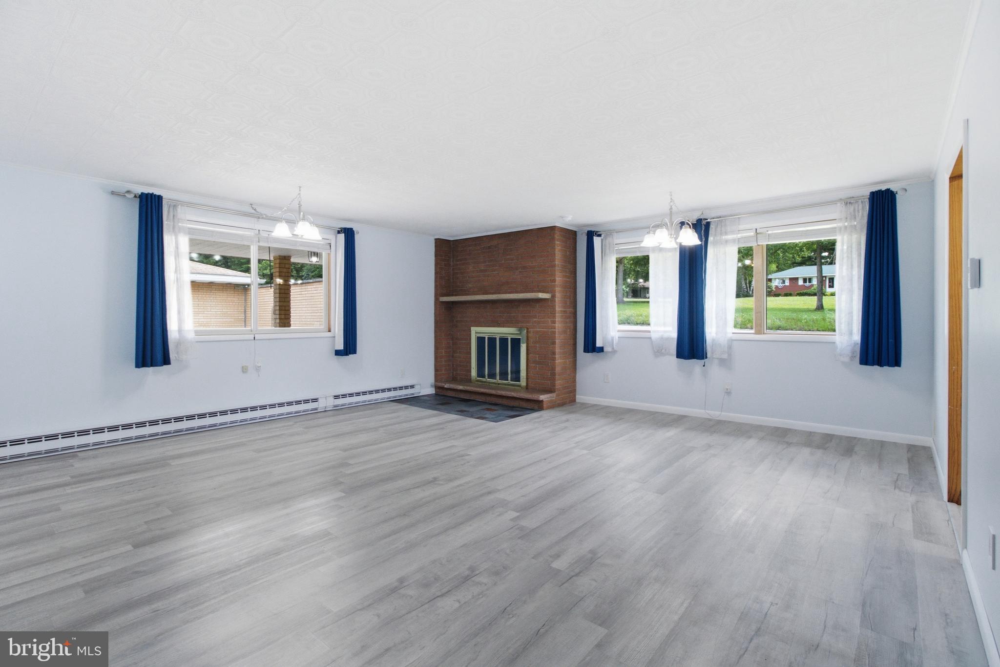 3361 Tyrone Pike Sandy Ridge, PA 16677 - Photo 11 of 53 Living room w/wood fireplace