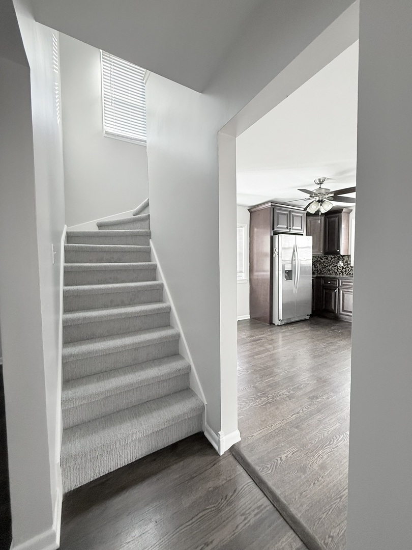 5850 South Neva Avenue Chicago, IL 60638 - Photo 12 of 17 a view of entryway and hall with wooden floor