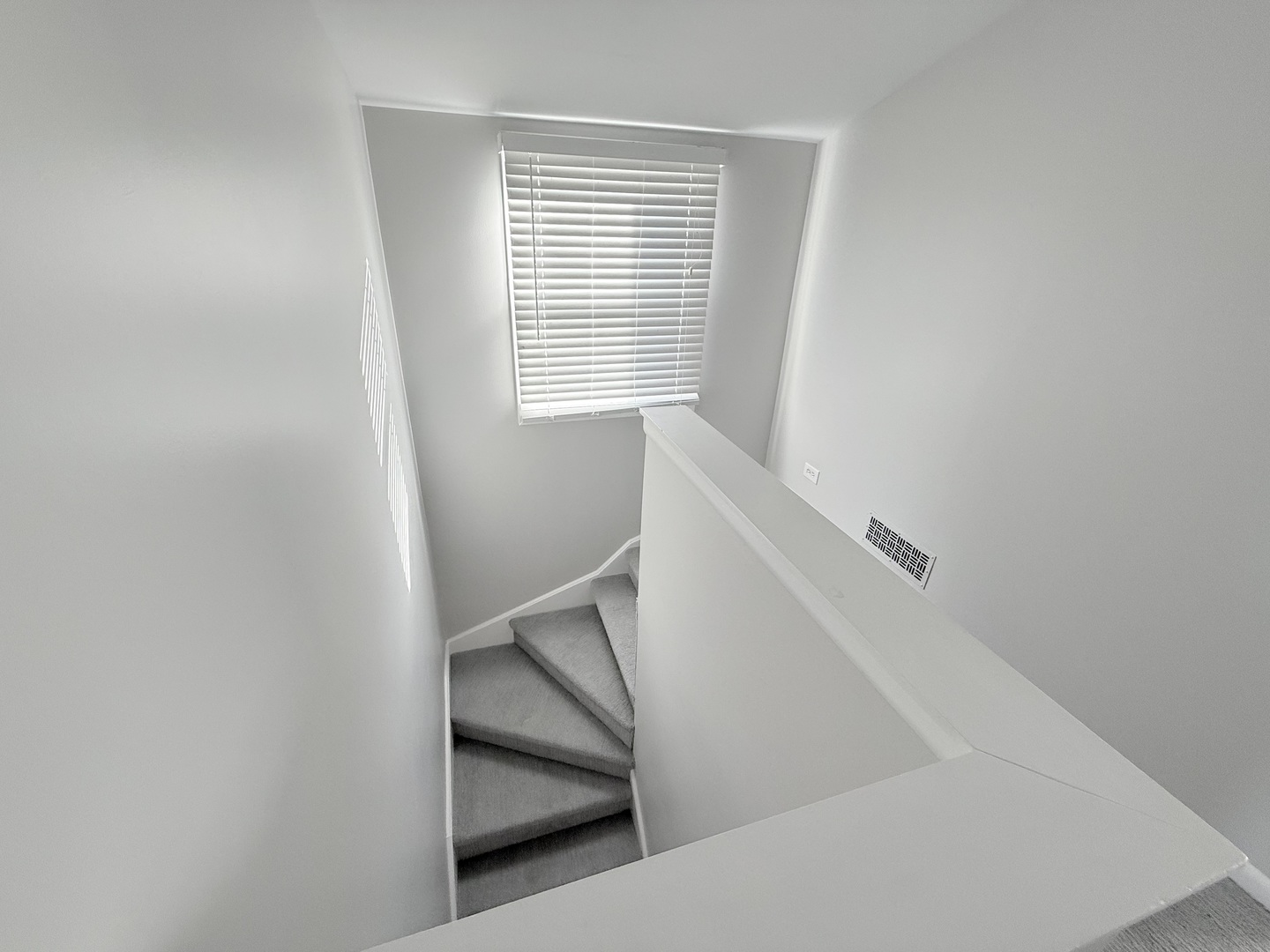 5850 South Neva Avenue Chicago, IL 60638 - Photo 13 of 17 a view of staircase with white walls and a window