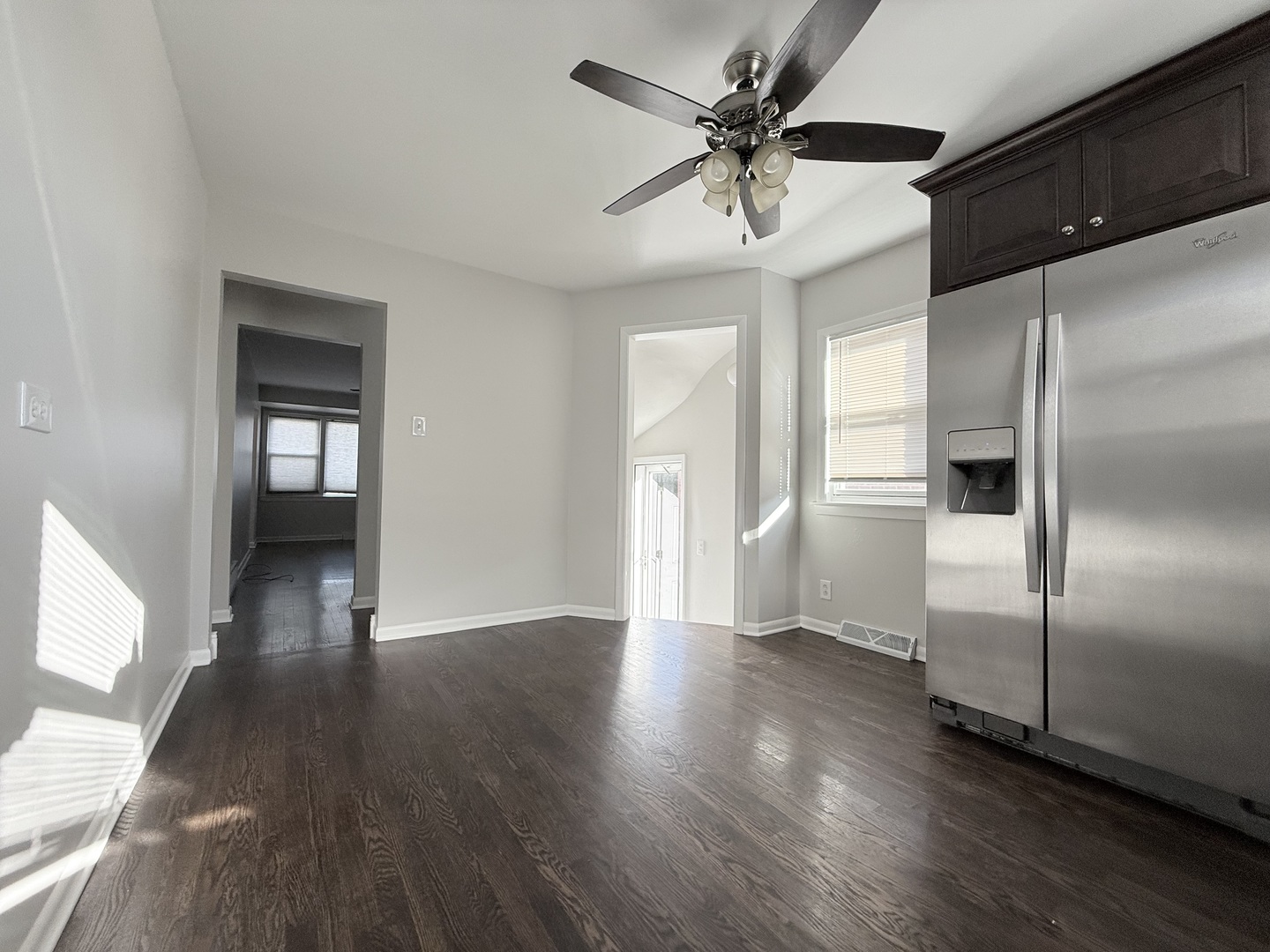 5850 South Neva Avenue Chicago, IL 60638 - Photo 7 of 17 wooden floor in an empty room with a window