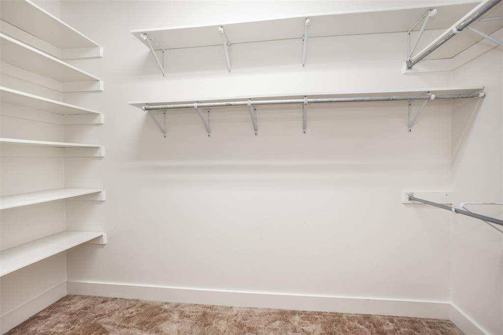 206 Ritchey Street Gainesville, TX 76240 - Photo 23 of 36 a view of an empty walk in closet