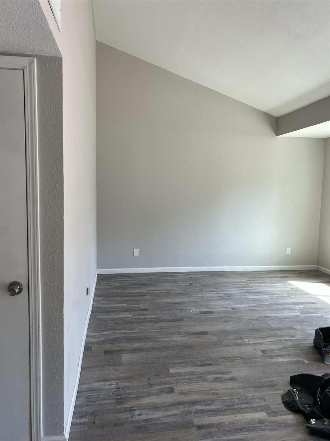 8603 Acapulco Way Stockton, CA 95210 - Photo 22 of 39 a view of a room with wooden floor