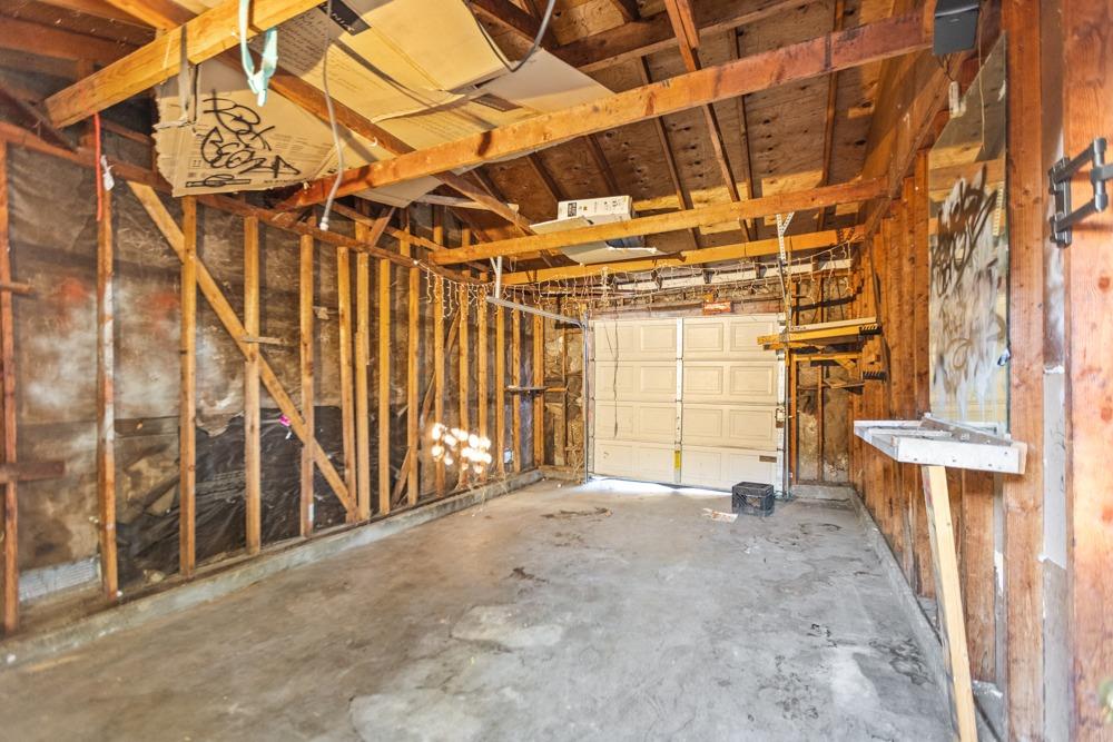 8603 Acapulco Way Stockton, CA 95210 - Photo 32 of 39 a view of a room with wooden walls
