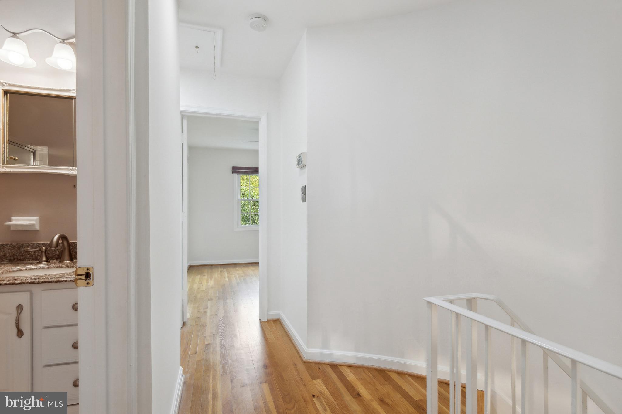 8407 Willow Forge Road Springfield, VA 22152 - Photo 24 of 45 Upstairs Hall w/Original Hardwoods