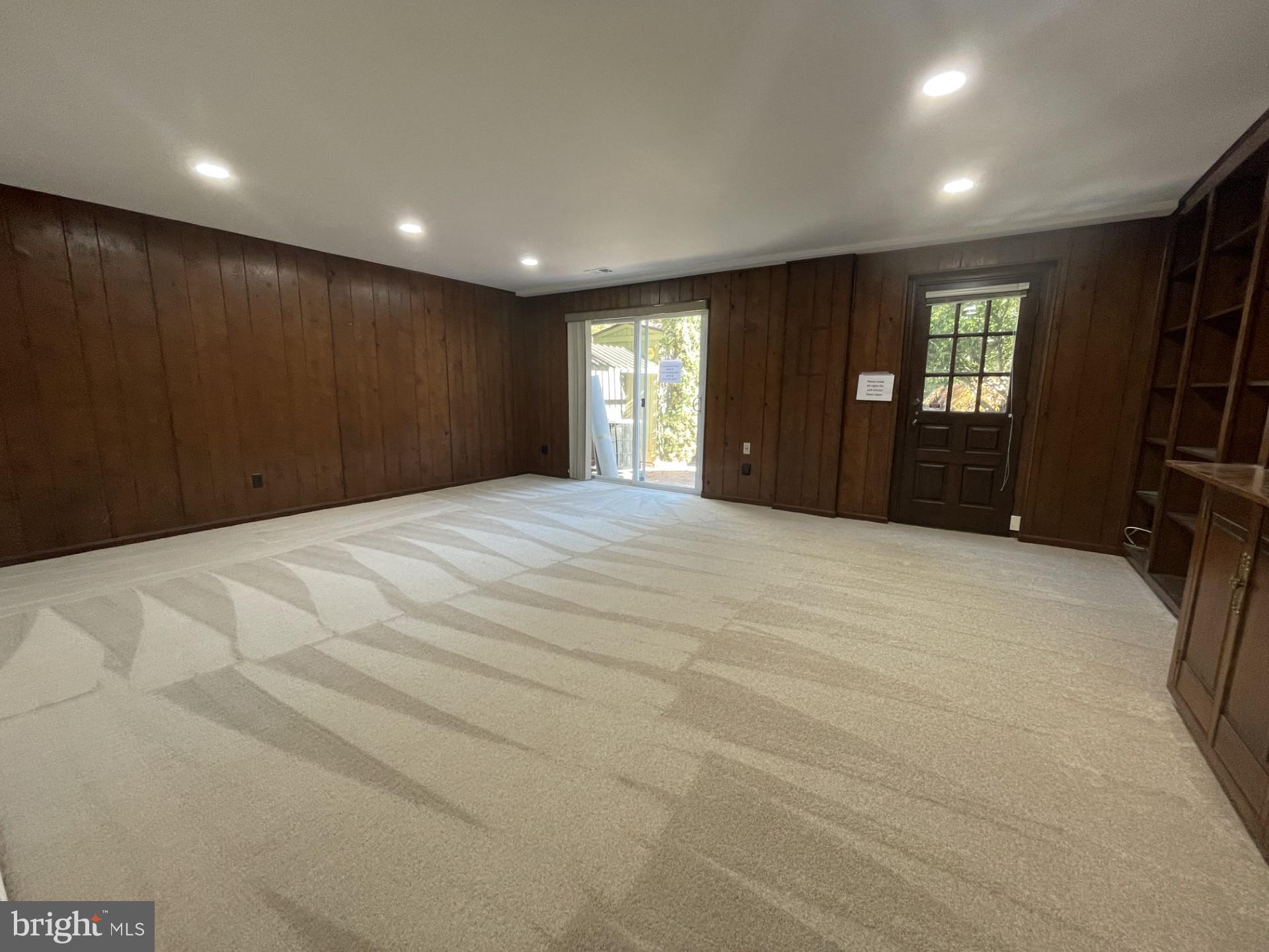 8407 Willow Forge Road Springfield, VA 22152 - Photo 28 of 45 New carpet just installed in walkout rec room