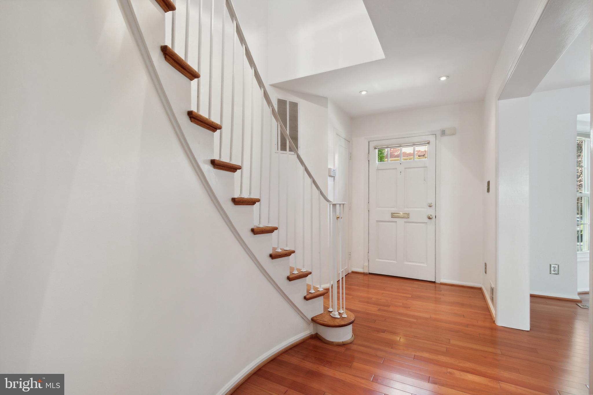 8407 Willow Forge Road Springfield, VA 22152 - Photo 5 of 45 Glowing Rosewood Floors Main Level