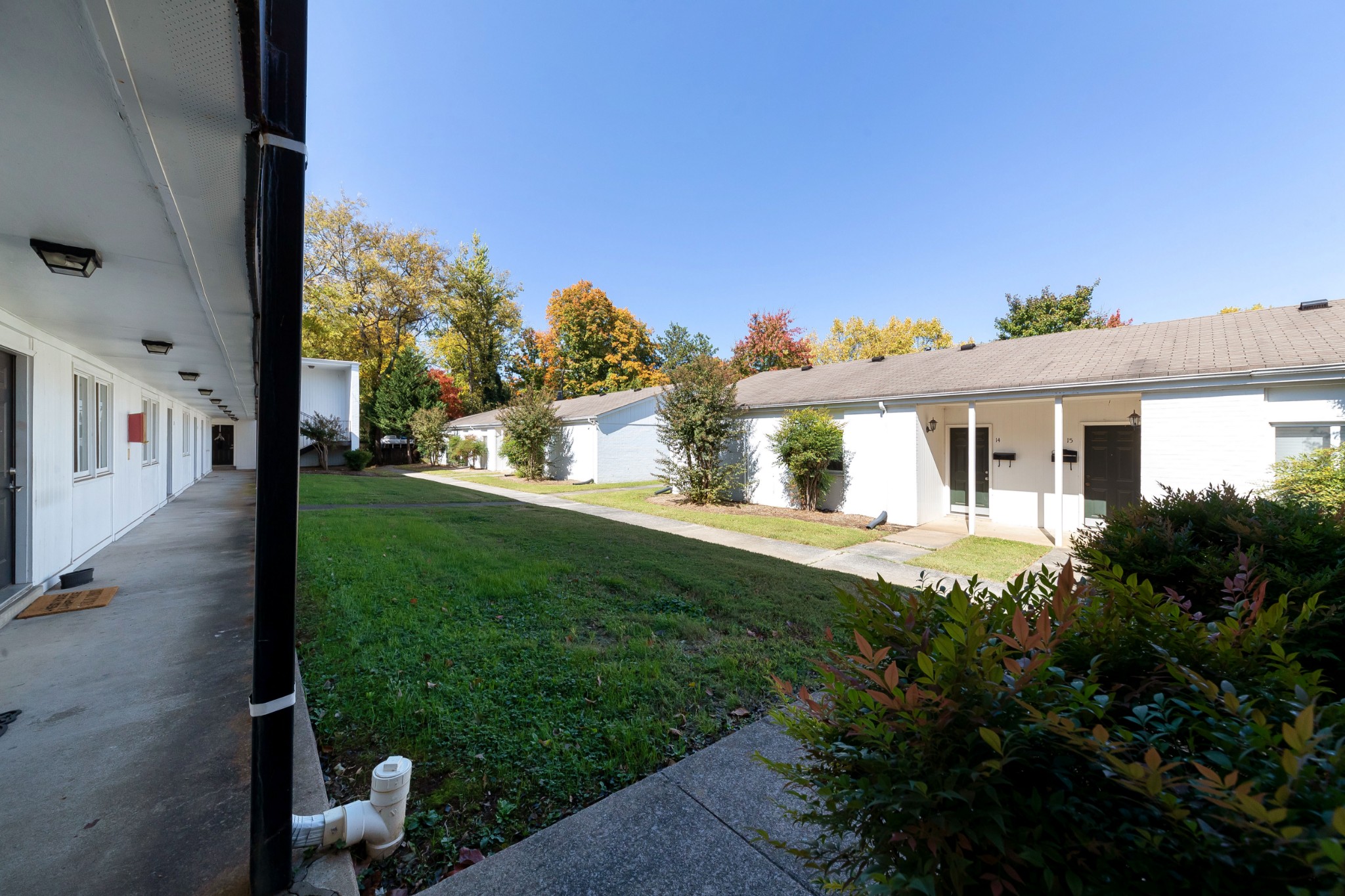 802 East Main Street, Unit 23 Murfreesboro, TN 37130 - Photo 19 of 21 a front view of a house with a yard