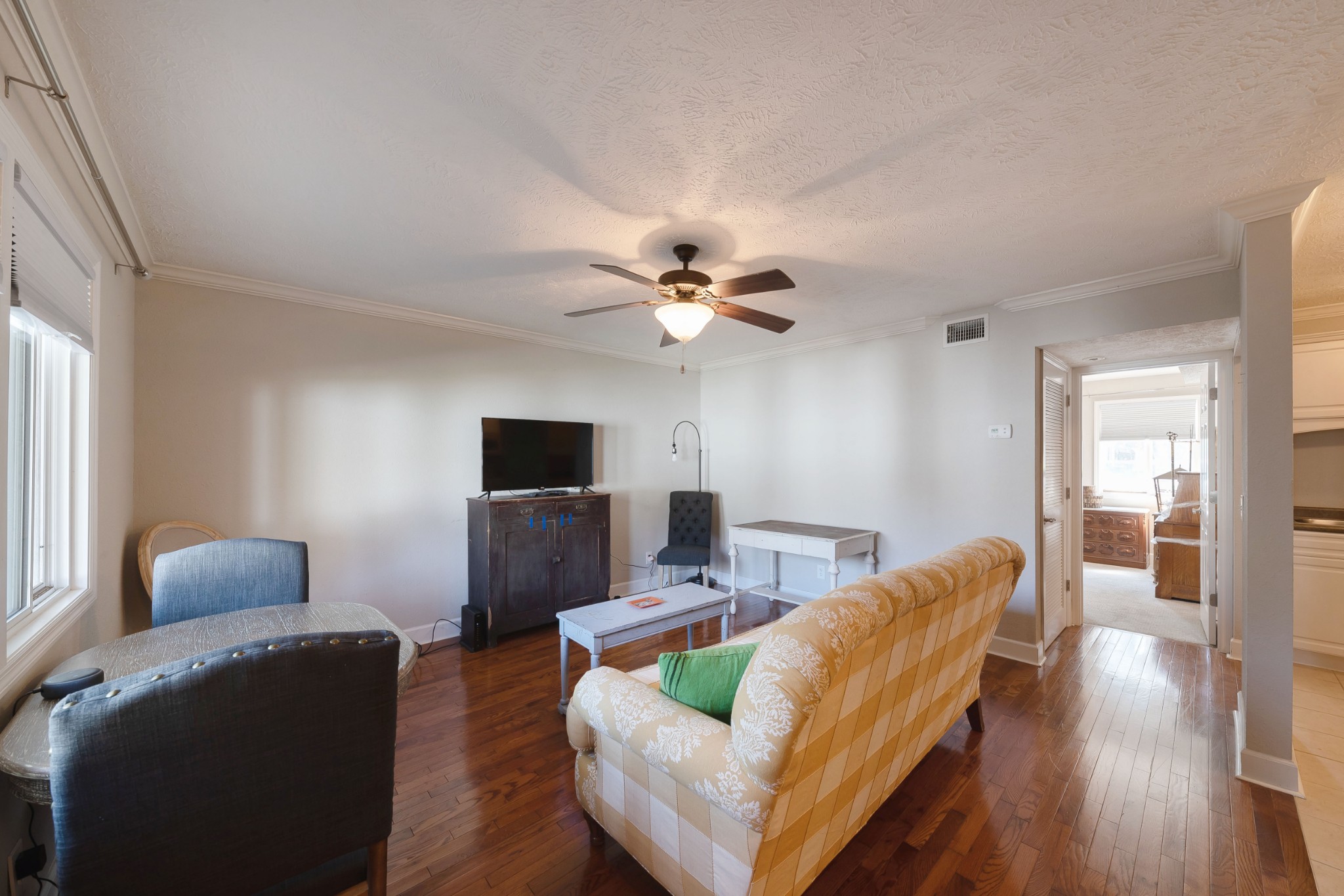 802 East Main Street, Unit 23 Murfreesboro, TN 37130 - Photo 5 of 21 a living room with furniture and a flat screen tv