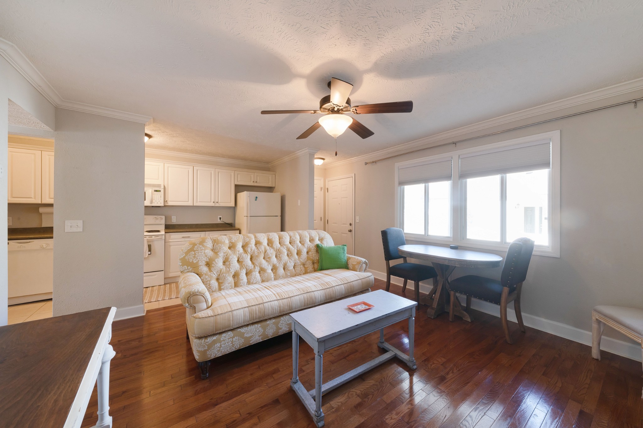 802 East Main Street, Unit 23 Murfreesboro, TN 37130 - Photo 6 of 21 a living room with furniture and wooden floor