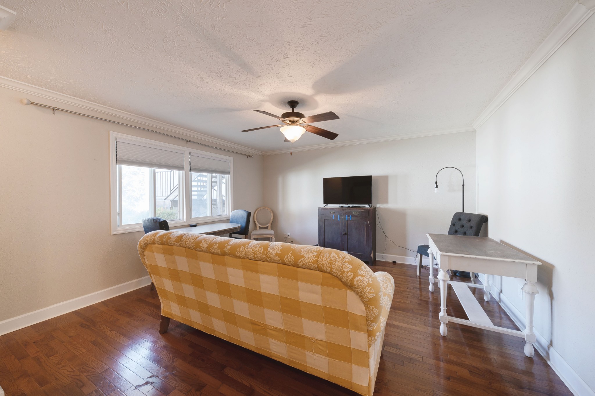 802 East Main Street, Unit 23 Murfreesboro, TN 37130 - Photo 7 of 21 a bedroom with a bed and wooden floor