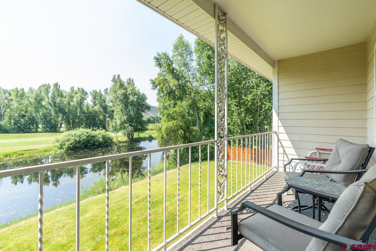 37480 Highway 50, Unit 2 Gunnison, CO 81230 - Photo 23 of 27 a view of a chairs and table in the balcony