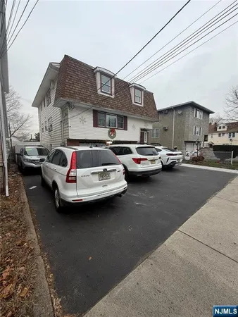 a car parked in front of a house