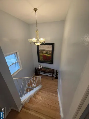 a view of a balcony with a car park