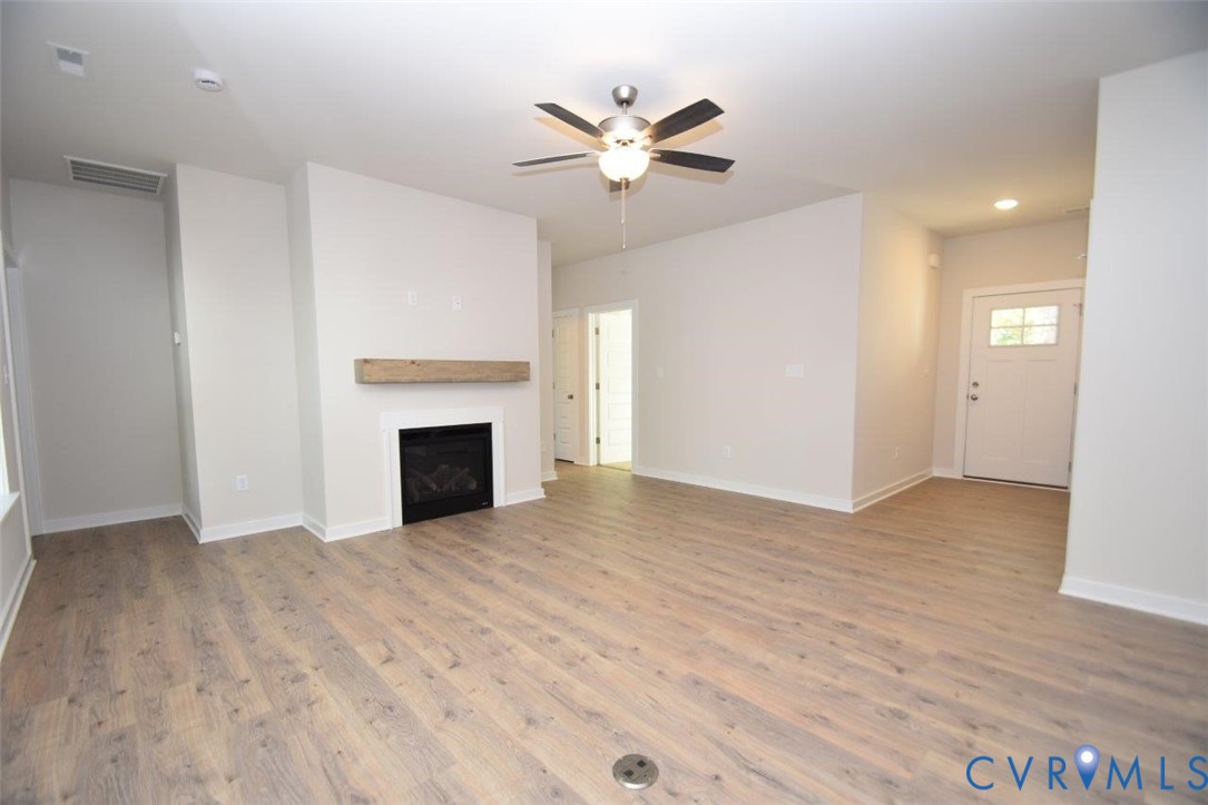 11675 Hanback Road Gordonsville, VA 22942 - Photo 11 of 19 Unfurnished living room with light wood-type floor