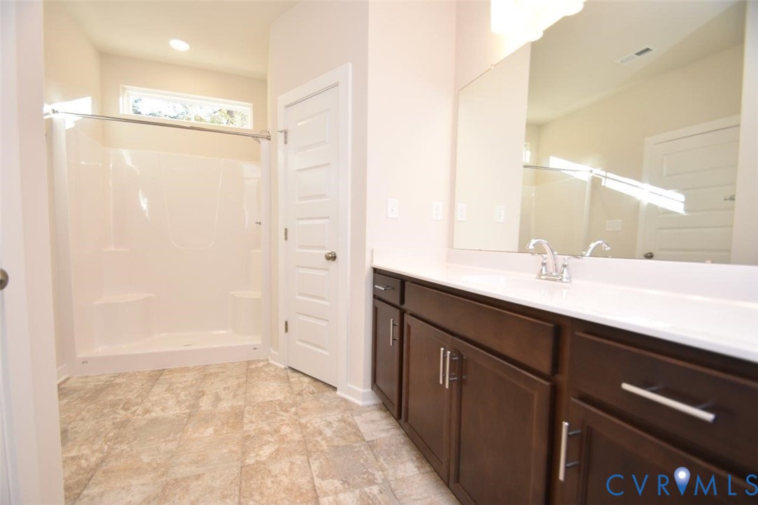 11675 Hanback Road Gordonsville, VA 22942 - Photo 14 of 19 Bathroom with vanity and a shower stall
