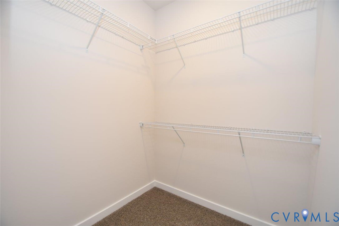 11675 Hanback Road Gordonsville, VA 22942 - Photo 15 of 19 Spacious closet featuring dark colored carpet